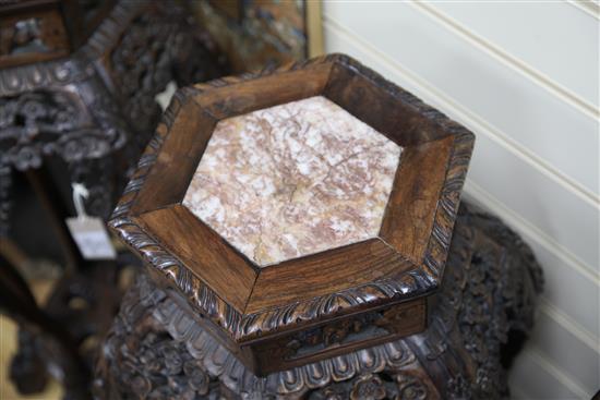 A pair of Chinese hongmu and rouge marble inset hexagonal stands, late 19th century, H.78cm